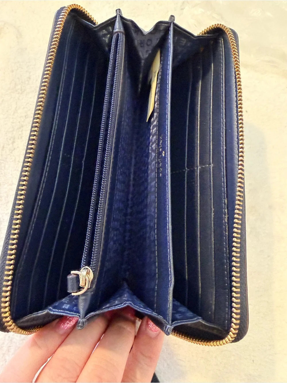 kate spade navy pebbled zip-around wallet with gold plate
